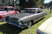 1965 Pontiac Parisienne 4-door Sedan  (with non-standard wheels)