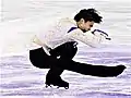 Deep sit spin with stretched free leg(Yuzuru Hanyu)