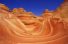 A photo of the wave on a sunny summer day