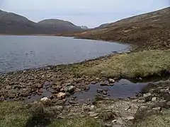 One of the many fords across the small burns feeding the N side of Loch a' Bhraoin, on the track to Lochivraon. The most distant peak in view, with some snow, is Slioch.