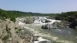 The Potomac River descends along the northern edge of the Cascades community until it reaches Great Falls Park 8 miles (13&nbsp;km) downstream.