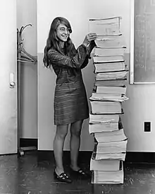 Image 17Margaret Hamilton standing next to the navigation software that she and her MIT team produced for the Apollo Project.