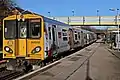 A Merseyrail Class 507 arrives with a service to Liverpool.