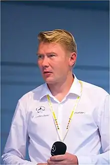 A photograph of Mika Häkkinen who was the leading McLaren driver on the starting grid.
