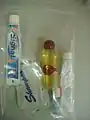 Travel toiletries in a reclosable plastic bag