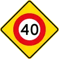 (W10-3) 40&nbsp;km/h speed limit ahead