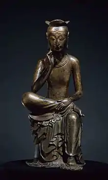 Pensive Bodhisattva Maitreya, Silla,  late 6th or early 7th century.  Gilt bronze, h. 93.5&nbsp;cm. National Treasure no. 83. National Museum of Korea.