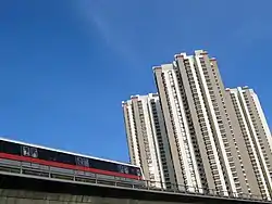 View of Housing and Development Board flats and the East West MRT line in Commonwealth, Queenstown.