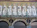 Vitalis among the saints, in Heaven, from the 6th century Basilica of Sant'Apollinare Nuovo, in Ravenna.