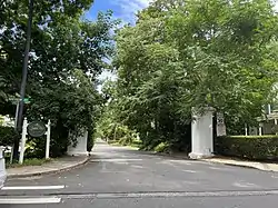 The Woodland Place entrance to Saddle Rock Estates on August 14, 2022.
