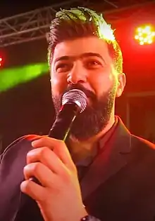 Saif Nabeel singing at the graduation ceremony, College of Medicine, University of Al-Qadisiyah on 1 April 2018.