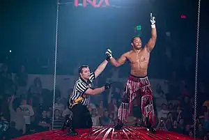 Jay Lethal and referee Rudy Charles on top of the Steel Asylum at Bound for Glory IV