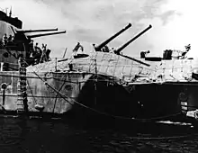 Image 38The light cruiser HMAS&nbsp;Hobart showing torpedo damage inflicted by a Japanese submarine on 20 July 1943. Hobart did not return to service until December 1944. (from History of the Royal Australian Navy)