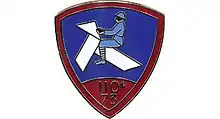 Insigne à partir de 1933 de la compagnie de tradition du 110e&nbsp;RIM ayant la garde du drapeau du 73e RI.