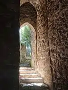Photographie de l'escalier menant au passage.