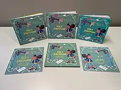 Couvertures du livre Ada & Zangemann en plusieurs langues : allemand, anglais, français, ukrainien, italien et arabe.