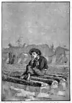 Garçon assis sur des rondins, le poing sous le menton, l'air pensif