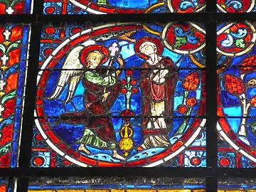 Sur un vitrail du XIIIe siècle de la cathédrale Notre-Dame de Laon.