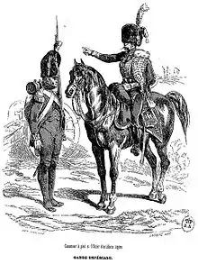 Un artilleur, à cheval, discutant avec son homologue à pied.