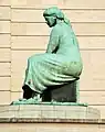 La Femme assise, à côté de la Banque Nationale, à Bruxelles.