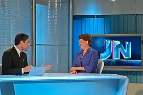 William Bonner, présentateur du journal, interviewant la présidente du Brésil Dilma Rousseff en 2011.