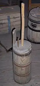 Baratte verticale à batte.