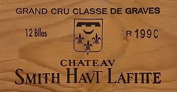 Estampe d'une façade de caisse en bois du millésime 1990.