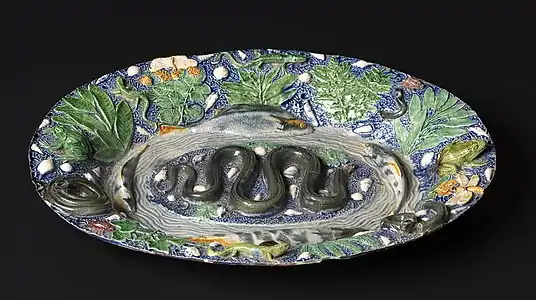 Bassin « rustique », attribué à Bernard Palissy. Fin du XVIe début du XVIIe&nbsp;siècle. Terre vernissée, moulages sur nature, glaçures plombifères. Paris, musée du Louvre.
