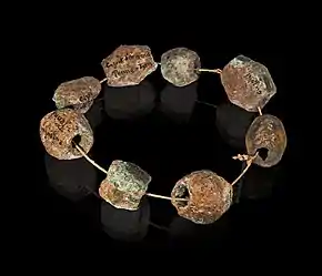 Parure en perles de bronze -  Holocène.