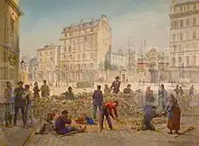  Aquarelle de Jean-Baptiste Arnaud-Durbec représentant la construction d'une barricade place Blanche le 19 mars 1871. Au premier plan, on distingue des gens dont un homme habillé d'un haut rouge courbé et armé d'une pioche pour desceller les pavés mis en place plus loin par ses camarades. Deux enfants sont allongés juste derrière la barricade de pavés, on distingue sur le côté droit inférieur du tableau au premier plan une femme qui tend un objet à un homme à genou, un balai reposant sur le sol derrière elle. Sur la gauche, un homme assis sur une paillasse semble casser la croûte, une femme et un chien assis à côté de lui. Trois hommes discutent sur le côté droit du tableau, et les autres personnages au second plan sont en train de placer les pavés pour élever la barricade. On distingue au-delà de la barricade située à l'ombre la place ensoleillée, avec des bâtiments. L'aquarelle est conservée au musée Carnavalet à Paris.