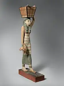 Modèle de porteuse d'offrandes. Bois peint/gesso. Déb. r. Amenemhat&nbsp;Ier, 1981-1975. H. 112 cm. Met