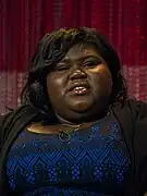 Gabourey Sidibe dans le rôle de Queenie