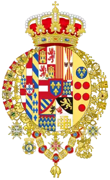 Blason surmonté d'une couronne royale et entouré de colliers en or