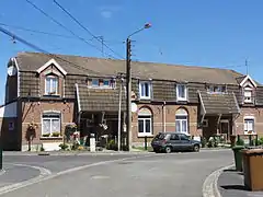 Un coron composé de quatre habitations.