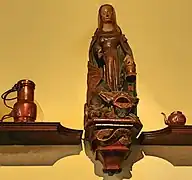 Statue de Sainte Marthe et la Tarasque, dans les cuisines de l'Hôtel-Dieu de Beaune (XVe&nbsp;siècle).