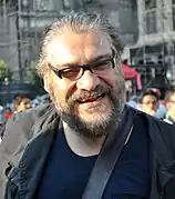 Joaquín Cosío&nbsp;(es) interprète Ernesto « Don Neto » Fonseca Carrillo