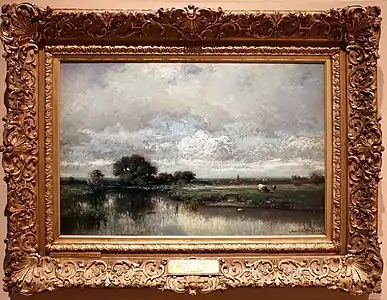 Pâturage au bord d'une mare