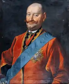 Portrait d'homme, chauve et moustachu.