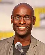 Lance Reddick dans le rôle de Papa Legba