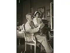 Le peintre et sa petite-fille.