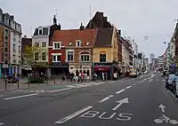 Rue du Molinel vue de la place du Vieux Marché aux chevaux vers la gare
