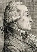 Portrait en noir et blanc d'un homme.