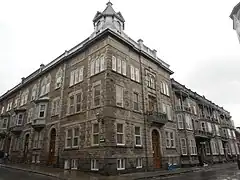 Les maisons en rangée bâties en 1899 sur le site