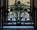 Casa Guazzoni, grille del Mazzucotelli dans l'entrée