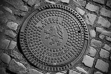 Autre exemple de plaque d'égout D 400.