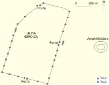 Plan schématisant l'emplacement d'un amphithéâtre antique en dehors de la ville.
