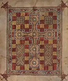 Croix intégrée à une page tapis dans les évangiles de Lindisfarne