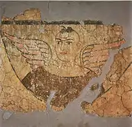 Figure masculine ailée, peinture murale du cycle pictural signé par Tita. Stupa M III, Miran, Xinjiang, IIIe – IVe&nbsp;siècle. New Delhi, National Museum.