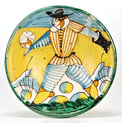 Assiette « Arlequin » avec la représentation d'un joueur de pallone, Montelupo Fiorentino, XVIIe&nbsp;siècle.