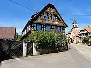 Ferme (XIXe&nbsp;siècle) (Maison "Schini" : pignon avec loggia à deux niveaux).